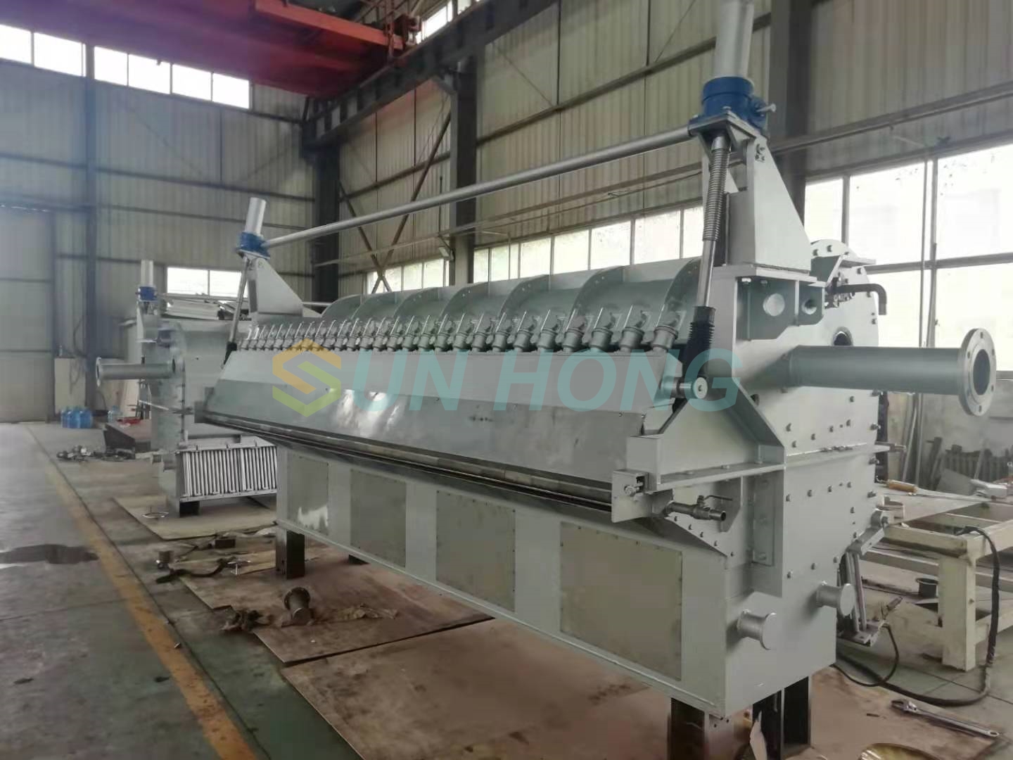 Cabezal hidráulico de máquina de papel