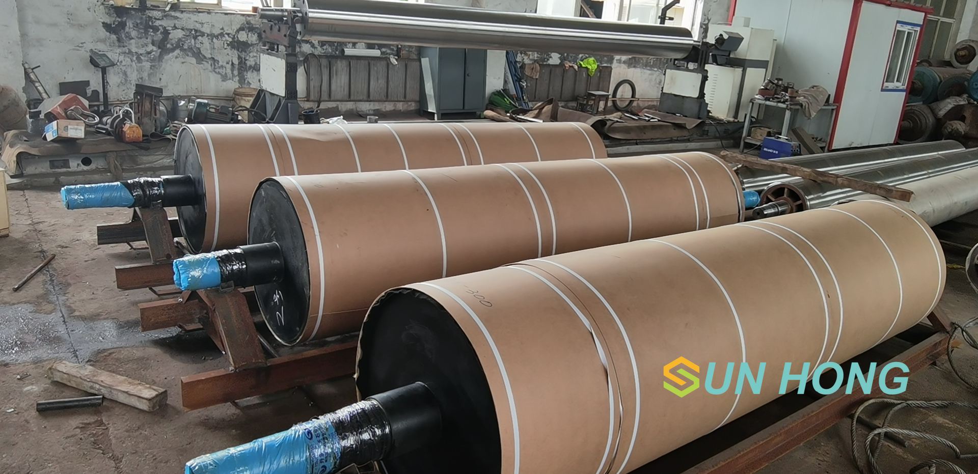 ¿Conoce la función del rollo de pechuga de la máquina de papel?