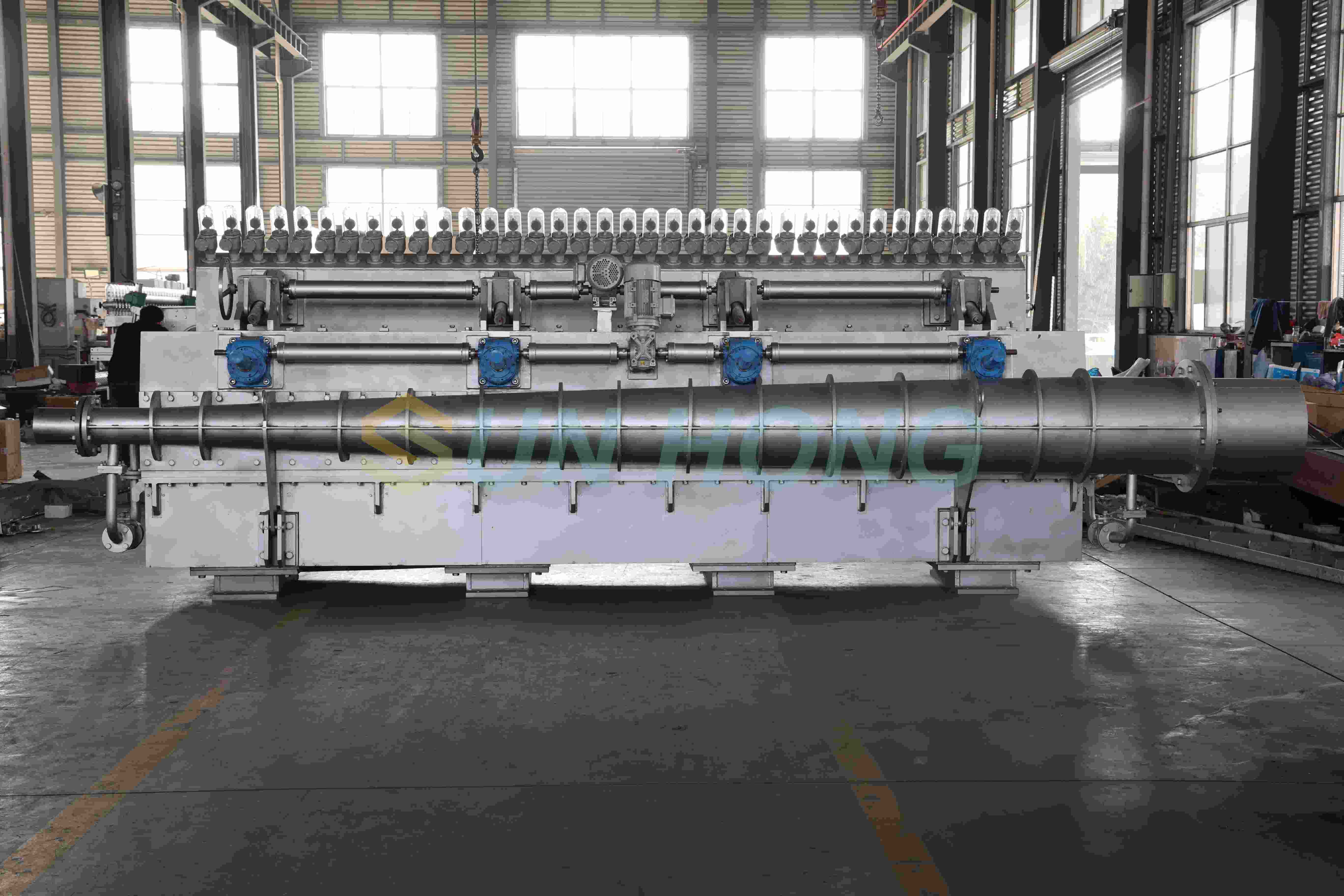 Cabezal hidráulico de máquina de papel